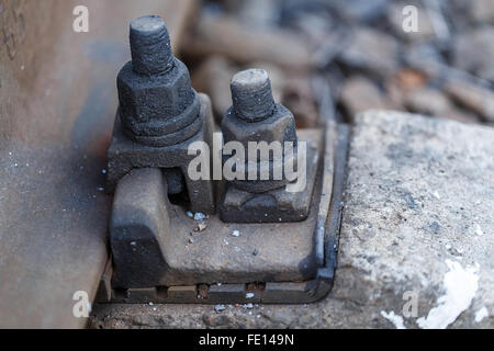 rails railway rusty bolt nut mount Stock Photo