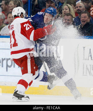 Tampa, Florida, USA. 3rd Feb, 2016. Tampa Bay Lightning left wing ONDREJ PALAT (18) checks Detroit Red Wings left wing TOMAS TATAR (21) during first period action at the Amalie Arena. Credit:  Dirk Shadd/Tampa Bay Times/ZUMA Wire/Alamy Live News Stock Photo