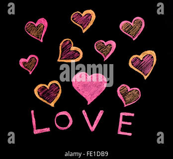 Love written on blackboard Stock Photo