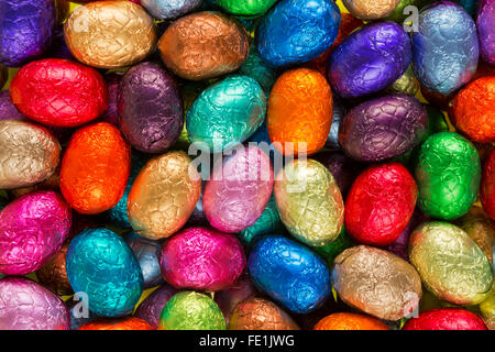 Assortment of multi-coloured chocolate Easter eggs. Stock Photo