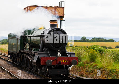 Steam train approaching Watchet Station on the West Somerset Railway, UK Stock Photo