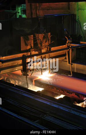 Gas cutting of the hot steel metal in a plant Stock Photo