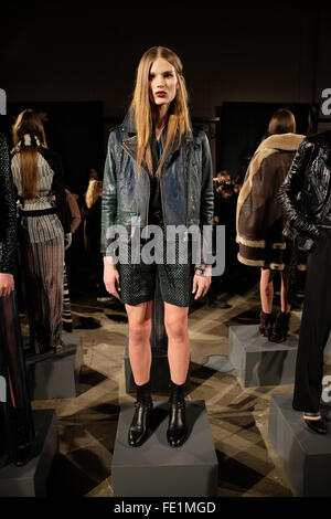 Stockholm, Sweden. 3rd Feb, 2016. A model displays a design from Swedish fashion brand J. Lindeberg during the Stockholm Fashion Week autumn/winter 2016 in Stockholm, capital of Sweden, on Feb. 3, 2016. The collection uses fabrics like soft mohair, wools and quilted nylons in rich earth tones blended into complex layers to create an impression of rain forests, tundra and highlands. © Rob Schoenbaum/Xinhua/Alamy Live News Stock Photo