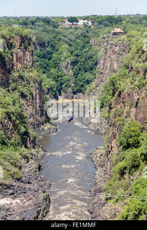 Ziplining or zip line over the Zambezi River, Zimbabwe, Africa Stock Photo