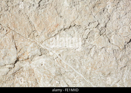 Warm white stone texture background in sunlight Stock Photo