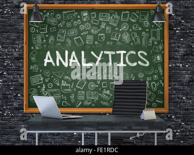 Chalkboard on the Office Wall with Analytics Concept. Stock Photo