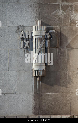 Fascist symbol depicted on the main facade of the Central train station (Stazione di Milano Centrale) in Milan, Lombardy, Italy. Number IX means 9th year of the fascist era (1931). Stock Photo