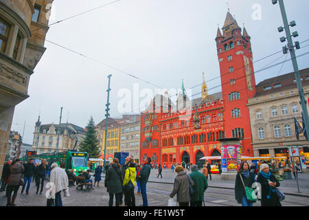 BASEL, SWITZERLAND - JANUARY 1, 2014: Street view to Town Hall in the Marktplatz in Basel. Basel is a third most populous city in Switzerland. It is located on the river Rhine. Stock Photo