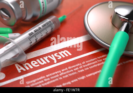 Aneurysm - Printed Diagnosis on Orange Background. Stock Photo