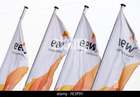 Hanover, Germany. 04th Feb, 2016. Flags of 'EEW Energy from Waste' wave at a waste burning facility in Hanover, Germany, 04 February 2016. Each year the 18 facilities from the EEW group can turn around 4.7 tons of waste into energy and dispose of it in an environmentally friendly way. Beijing Enterprises from China is acquiring the Helmstedt-based waste burning specialists EEW Energy from Waste for 1.438 billion euros. Photo: JULIAN STRATENSCHULTE/dpa/Alamy Live News Stock Photo