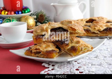 Pieces of strudel stuffed with apples and jam Stock Photo