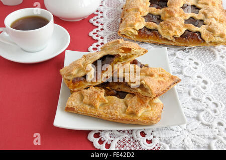 Pieces of strudel stuffed with apples and jam Stock Photo