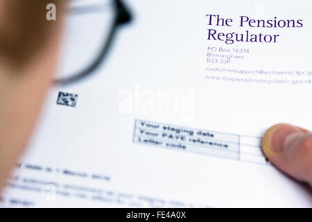 Employer looking at information about the UK government's Pensions Regulator Stock Photo