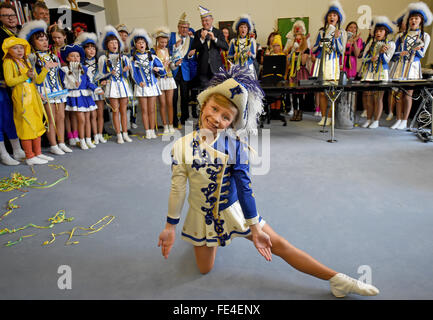 Hanover, Germany. 04th Feb, 2016. Carnival enthusiast Sophie from Linden, Germany, dances in the office of Stephan Weil (back C), premier of the German state Lower Saxony, at the State Chancellery in Hanover, Germany, 04 February 2016. Photo: HOLGER HOLLEMANN/dpa/Alamy Live News Stock Photo