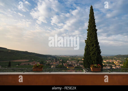 View from a hotel terrace on villages and vineyards of the Valpolicella wine region near Verona, Italy, at a sunny morning Stock Photo