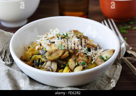 mushrooms pasta with cheese, food in bowl Stock Photo