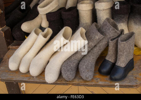 Traditional Russian valenki (felt boots) for children on a stall at Izmailovsky flea market, Moscow, Russia Stock Photo
