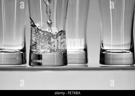 A studio photo of a tall water glass Stock Photo