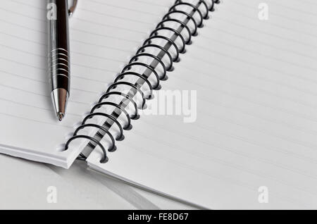 Empty notebook on wooden table Stock Photo