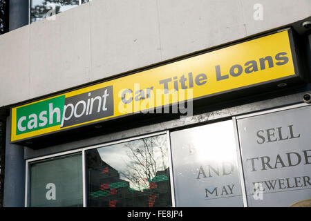 A logo sign outside of a CashPoint car title loan office in Tysons, Virginia on January 1, 2016. Stock Photo
