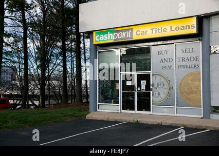 A logo sign outside of a CashPoint car title loan office in Tysons, Virginia on January 1, 2016. Stock Photo
