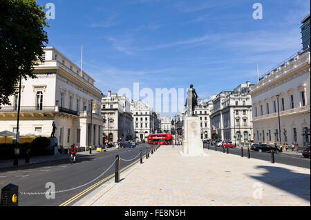 A scenic view of Waterloo Place with the Athenaeum Club building on the left and King Edward VII on horseback, London. Stock Photo