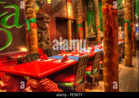 Exotic, rustic Asian themed dining room Stock Photo