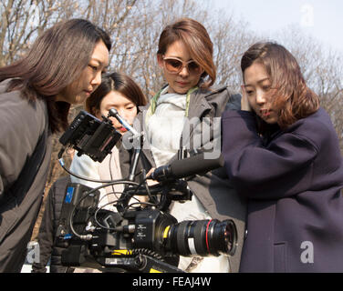 Shiho Yano, Feb 4, 2016 : Japanese model Shiho Yano (2nd R) looks a video filmed during a photo shoot for a South Korean brand 'BE GE' in Gwangju, southeast of Seoul, South Korea. © Lee Jae-Won/AFLO/Alamy Live News Stock Photo