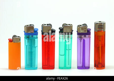 A picture or image showing  a row of different colored plastic cigarette lighters Stock Photo