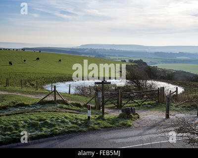 A misty view south east from Ditchling Beacon across the South Downs near Brighton, Sussex Stock Photo