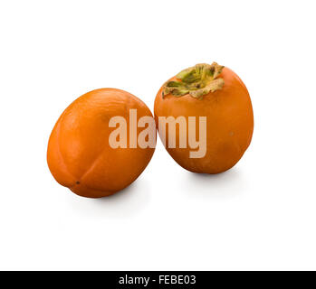 Organic Persimmons isolated on white Stock Photo