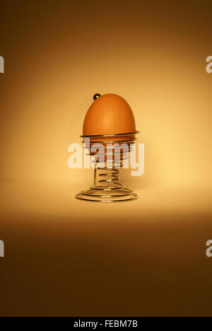 egg cup in the spot light, Stock Photo