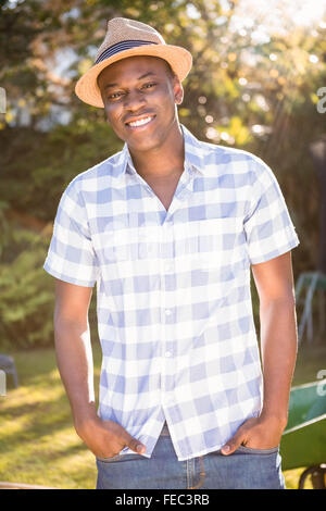 Handsome man wearing straw hat Stock Photo