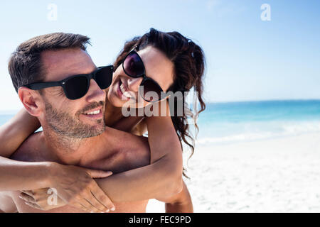 Cute couple hugging with arms around Stock Photo