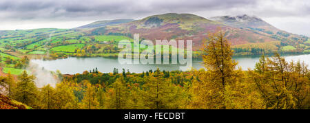 View towards Darling Fell and Low Fell over Loweswater and Holme Wood in the Lake District National Park, Cumbria, England Stock Photo