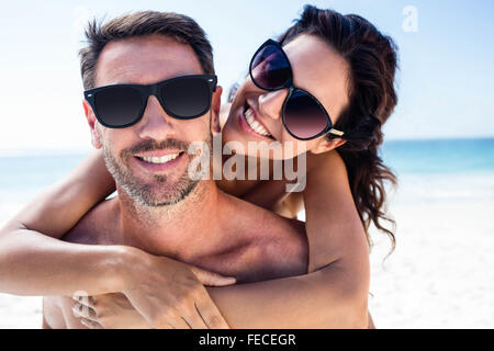 Cute couple hugging with arms around Stock Photo