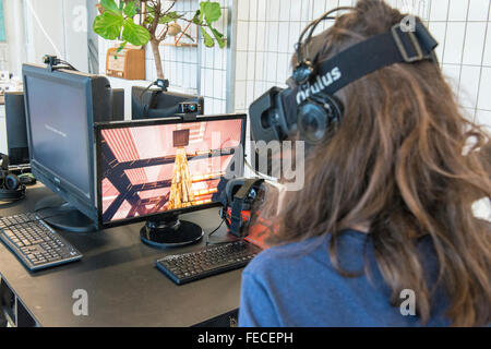 Copenhagen, Denmark. 5th February, 2016. Khora is a pop-up space in the meatpacking district of Copenhagen, where people can walk in and try different levels of virtual reality. Schools will be able to come in on field trips, companies can come in to see what is possible with VR. VR enthusiasts will be able to come in and collaborate with fellow content creators. Their goal is to create an environment where ideas about virtual reality can develop and come to life.  Pictured is 13-year-old Alexander Ramskov Galamba, from Albertslund Lilleskole, as he tests out one of the VR headsets. © Matthew Stock Photo