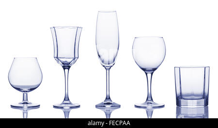 Glasses for various alcoholic drinks isolated on the white background. Stock Photo