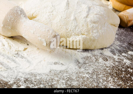 White bread drought and flour on kitchen table Stock Photo - Alamy