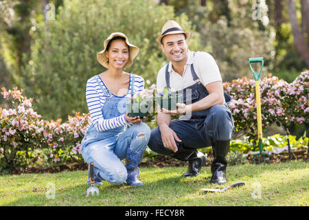 Cute couple doing some gardening activities Stock Photo