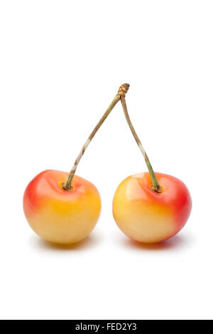 Pair of fresh Rainier cherries on white background Stock Photo