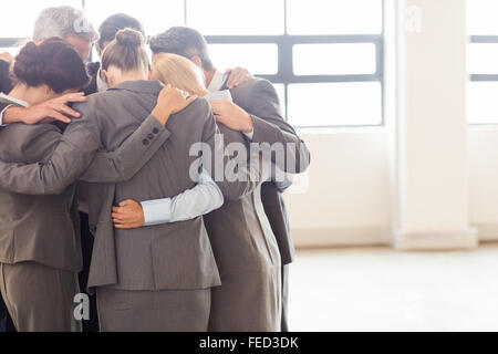 Business team huddling Stock Photo