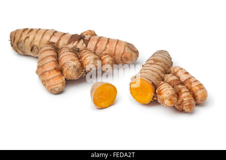 Fresh curcuma root with slices on white background Stock Photo