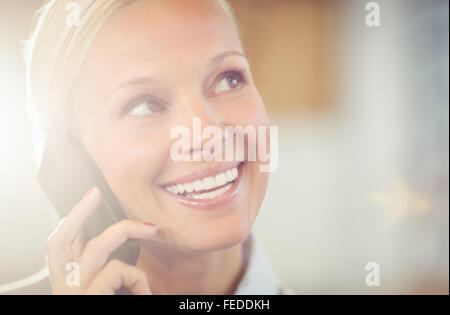 Businesswoman using her smart phone Stock Photo