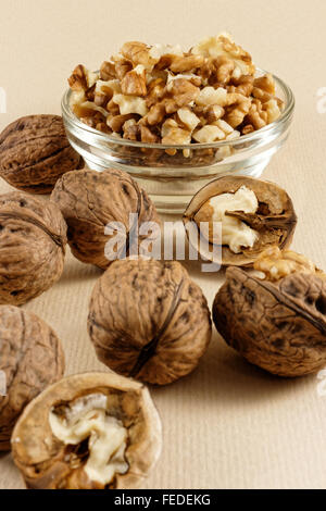 Walnuts in glass bowl Stock Photo