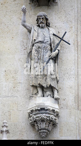 Saint John The Baptist above the portal of the cathedral dedicated to the Assumption of Mary in Zagreb, Croatia Stock Photo