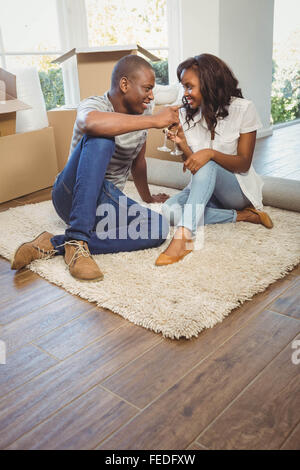 Ethnic couple toasting with champagne Stock Photo