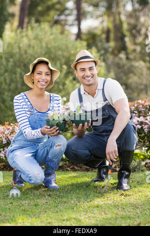 Cute couple doing some gardening activities Stock Photo