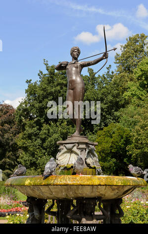 A female sculpture of an archer on top of a water fountain in Hyde Park, London, United Kingdom. Stock Photo