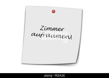 Zimmer aufräumen (German clean up room) written on a memo isolated on white background Stock Photo